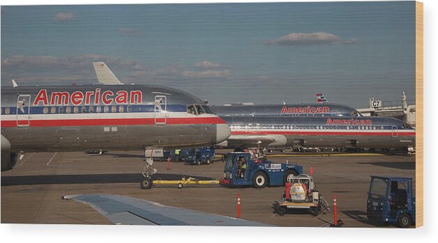 Aircraft Wood Print featuring the photograph Passenger Airliners At An Airport by Jim West