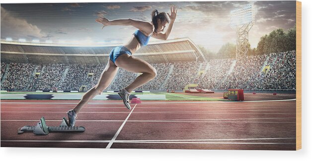 Event Wood Print featuring the photograph Female Athlete Sprinting #1 by Dmytro Aksonov