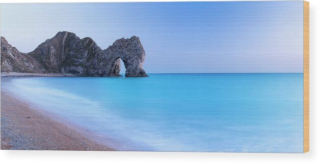 Water's Edge Wood Print featuring the photograph Natural Stone Arch, Dorset, Uk #1 by Travelpix Ltd