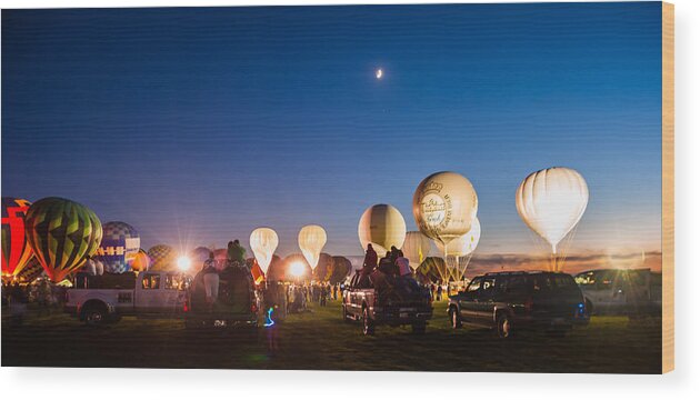 Multiple Hot Air Balloons Wood Print featuring the photograph Multiple Hot air Balloons night glow by Charles McCleanon