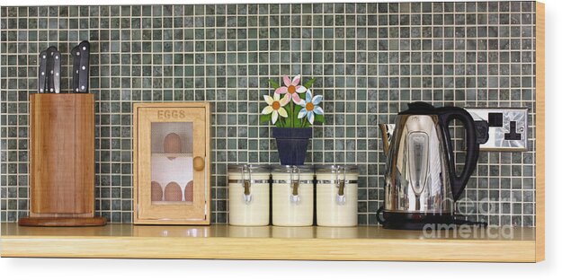 Block Wood Print featuring the photograph Clean kitchen worktop with kitchen items by Simon Bratt