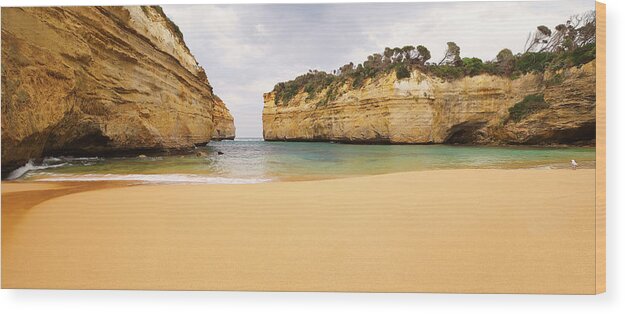 Water's Edge Wood Print featuring the photograph Loch Ard Gorge Beach by Visual Clarity Photography
