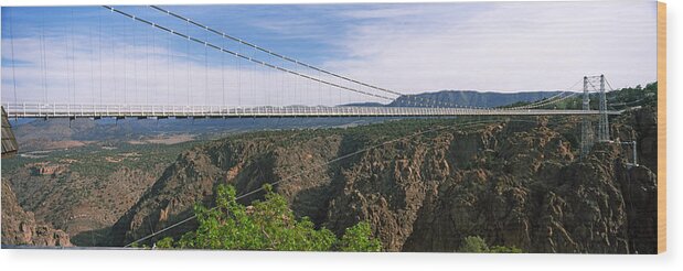 Photography Wood Print featuring the photograph Suspension Bridge Across A Canyon #4 by Panoramic Images