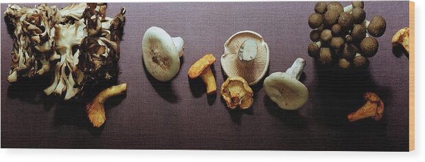 Vegetables Wood Print featuring the photograph An Assortment Of Mushrooms by Romulo Yanes