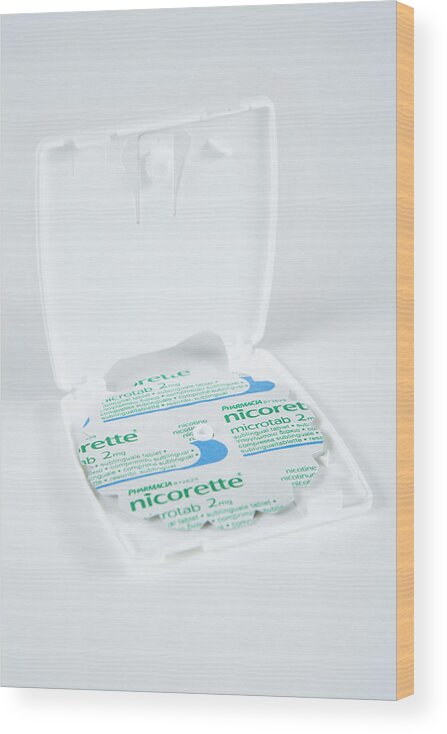 Nicorette Microtab Wood Print featuring the photograph Nicorette Microtab Pills #1 by Gustoimages/science Photo Library