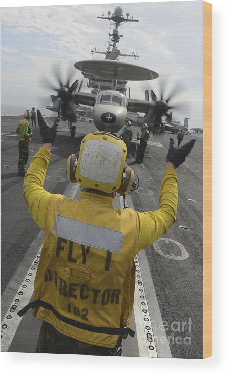 Military Wood Print featuring the photograph Aviation Boatswains Mate Directs An #6 by Stocktrek Images