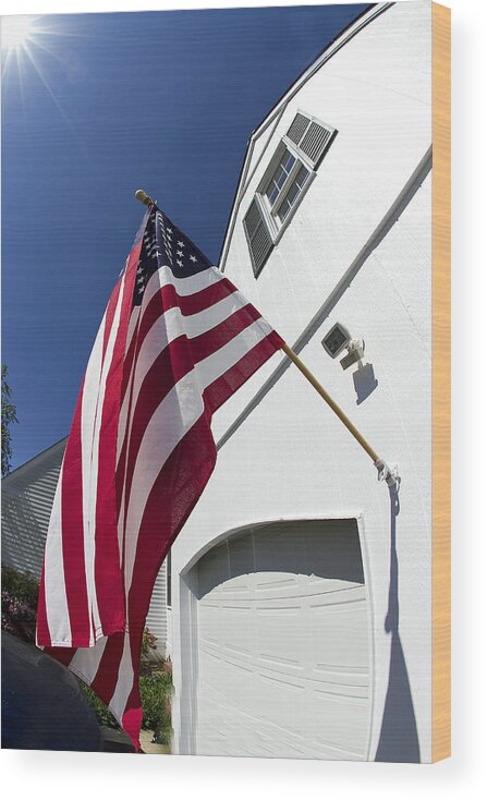 Patriotic Wood Print featuring the photograph American Flag Flying Proudly by Trudy Wilkerson