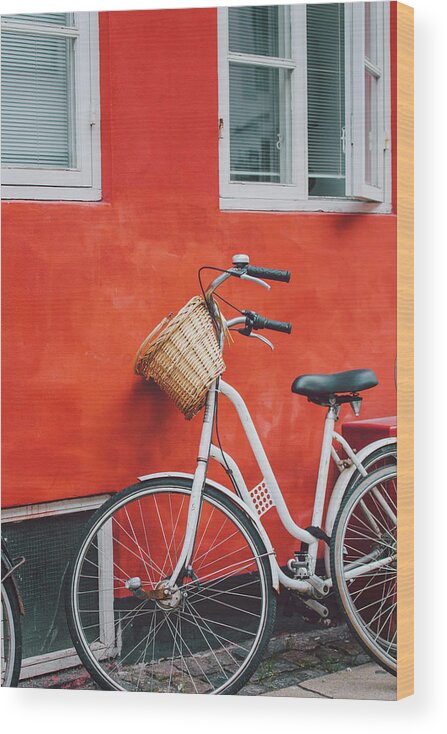 Tranquility Wood Print featuring the photograph Bicycle Leaning On Red Wall by Julia Davila-lampe