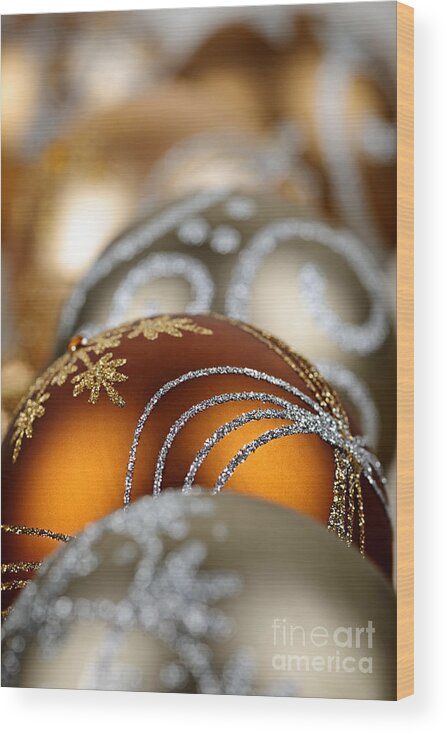 Christmas Wood Print featuring the photograph Gold Christmas ornaments by Elena Elisseeva