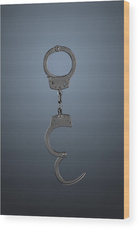 Handcuffs Wood Print featuring the photograph Handcuffs by Joe Belanger