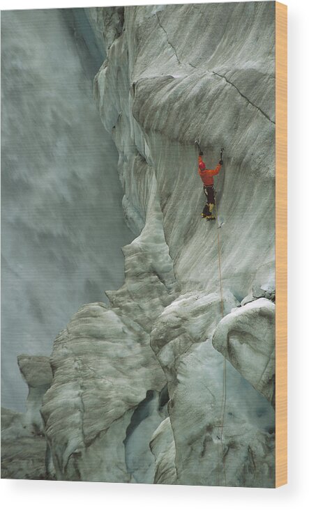 Feb0514 Wood Print featuring the photograph Ice Climber In Fox Glacier Crevasse by Colin Monteath