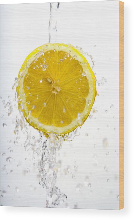 Lemon Wood Print featuring the photograph Lemon Splash by Alexey Stiop