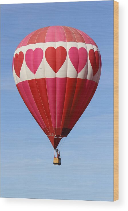 Balloon Fiesta Wood Print featuring the photograph Love is in the Air by Mike McGlothlen
