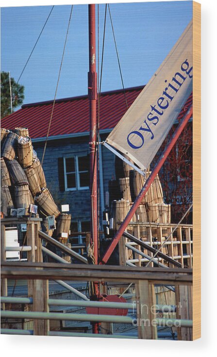Oystering Wood Print featuring the photograph Oystering History at the Maritime Museum in Saint Michaels Maryland by William Kuta