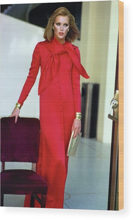 #condenastvoguephotograph Wood Print featuring the photograph Patti Hansen Wearing A Red Dress by Arthur Elgort
