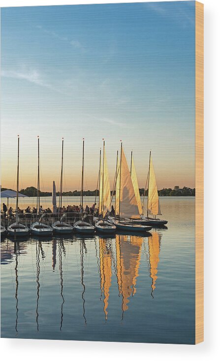 Pole Wood Print featuring the photograph People Relaxing At Yacht Harbor At by Thomas Winz