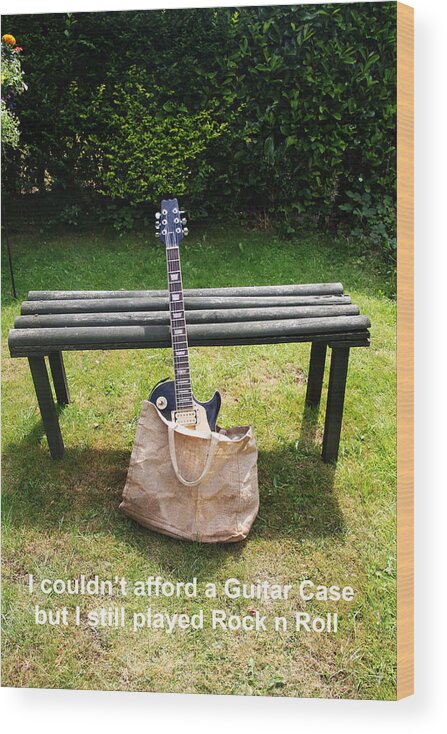 Guitar Wood Print featuring the photograph Rock n Roll Guitar in a bag by Tom Conway