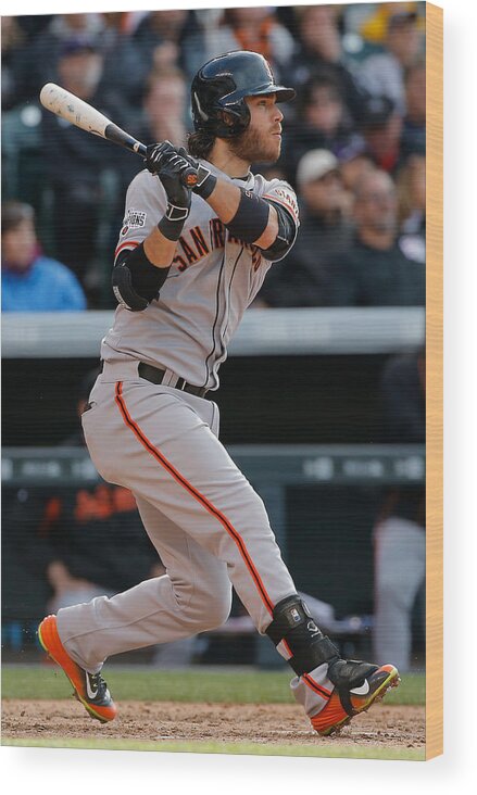People Wood Print featuring the photograph San Francisco Giants v Colorado Rockies - Game One by Doug Pensinger