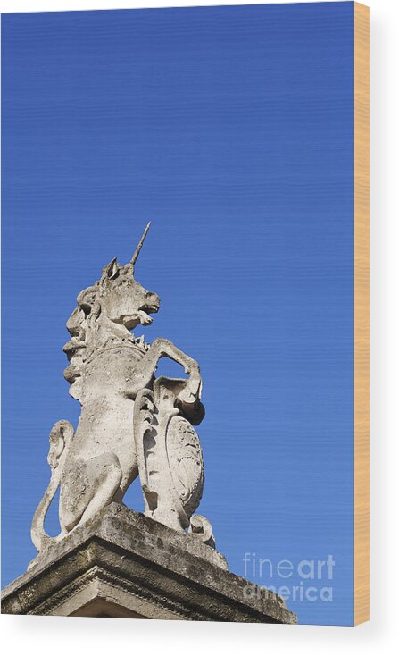 London Wood Print featuring the photograph Statue of a unicorn on the walls of Buckingham Palace in London England by Robert Preston