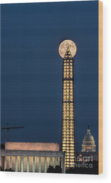 Full Moon Wood Print featuring the photograph Washington Monument piercing the full moon by Izet Kapetanovic