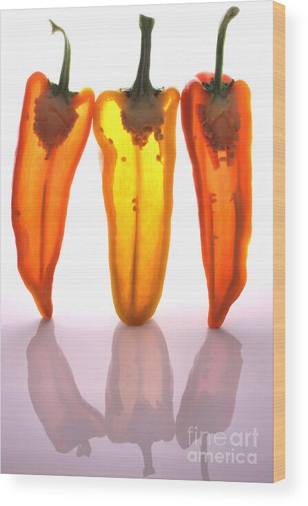 Fresh Wood Print featuring the photograph Peppers in half by Simon Bratt