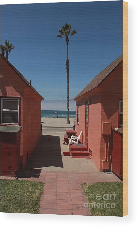 Beach Wood Print featuring the photograph Beach cottages #1 by Kim Pascu