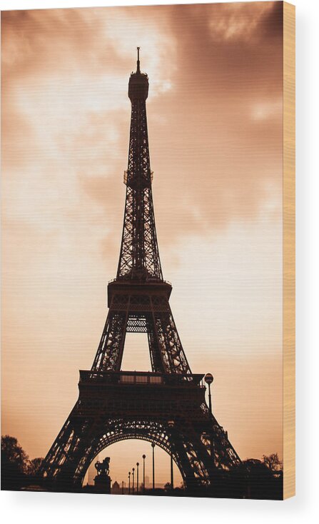 Eiffel Tower Wood Print featuring the photograph The Eiffel Tower in Paris During Sunset by Nila Newsom