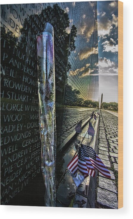 Vietnam War Wood Print featuring the photograph An early morning look at Vietnam Veterans Memorial by Sven Brogren