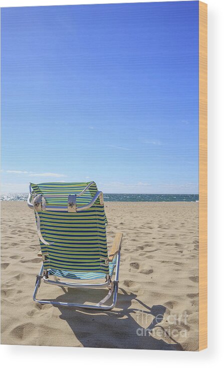 Sand Wood Print featuring the photograph Beach Chair on a sandy beach by Edward Fielding