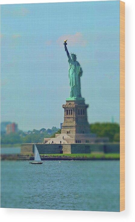 Big Statue Little Boat Wood Print featuring the photograph Big Statue, Little Boat by Sandy Taylor