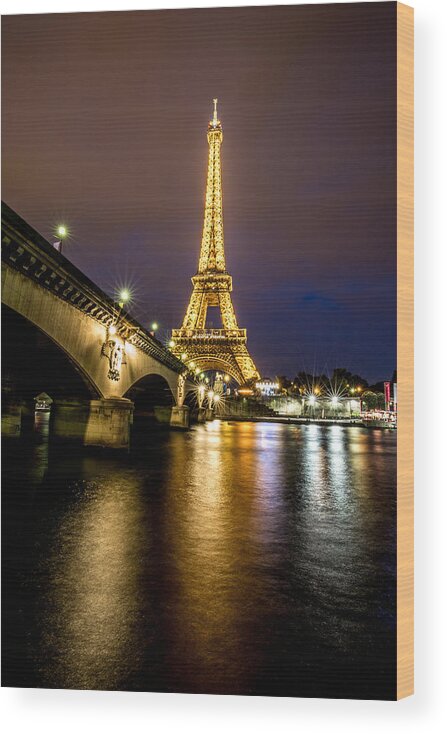 Paris Wood Print featuring the photograph Eiffel Tower at Night by Lev Kaytsner