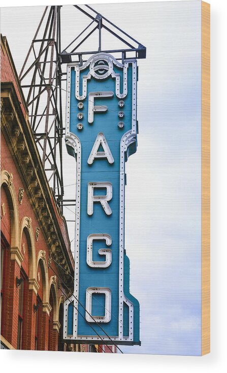 Fargo; Cinema; Blue; Overhead; Sign; City; Theater; Movie-house; Big; Screen; Film; Flicks; Motion; Pictures; Movies; Theater; Picture-show; Playhouse; Silver-screen; Centre; Performing; Arts; Hall; Locale; Site; Entertainment; Attraction; Recreation; Leisure; Lifestyles; Building; Architecture; Landmark; Nd; North; Dakota; America; Usa; Wood Print featuring the photograph Fargo Blue Theater Sign by Chris Smith