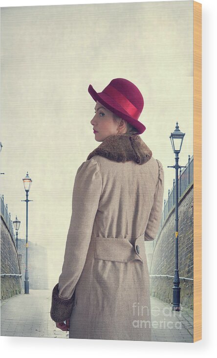 Historical Wood Print featuring the photograph Historical Woman In An Overcoat And Red Hat by Lee Avison