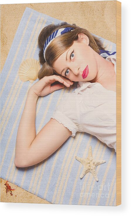 Australia Wood Print featuring the photograph Hot retro pinup girl lying on beach in Australia by Jorgo Photography