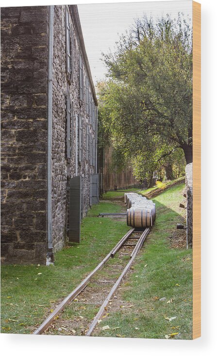 American Wood Print featuring the photograph Oak barrels outside stone distillery by Karen Foley