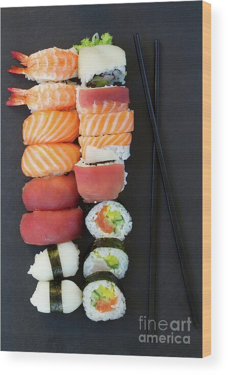 Sushi Wood Print featuring the photograph Sushi and Chopsticks by Anastasy Yarmolovich