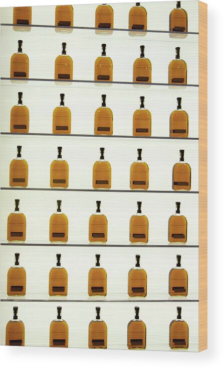 American Wood Print featuring the photograph Woodford Reserve Visitors Center bottle display by Karen Foley