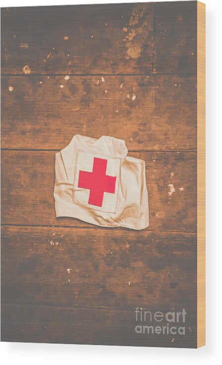Nurse Wood Print featuring the photograph WW2 nurse cap lying on wooden floor by Jorgo Photography