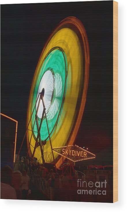 Blurred Motion Wood Print featuring the photograph Ferris Wheel In Motion #1 by Bettmann