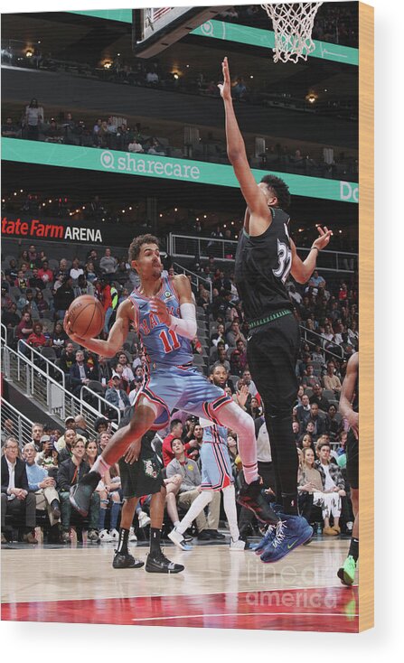 Trae Young Wood Print featuring the photograph Minnesota Timberwolves V Atlanta Hawks by Jasear Thompson