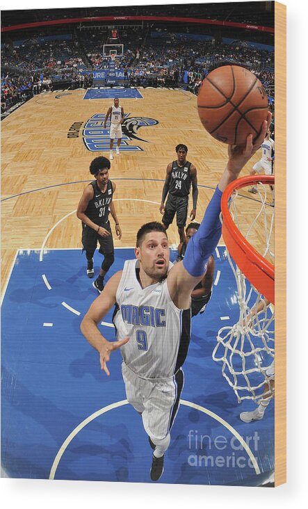 Nba Pro Basketball Wood Print featuring the photograph Brooklyn Nets V Orlando Magic by Fernando Medina