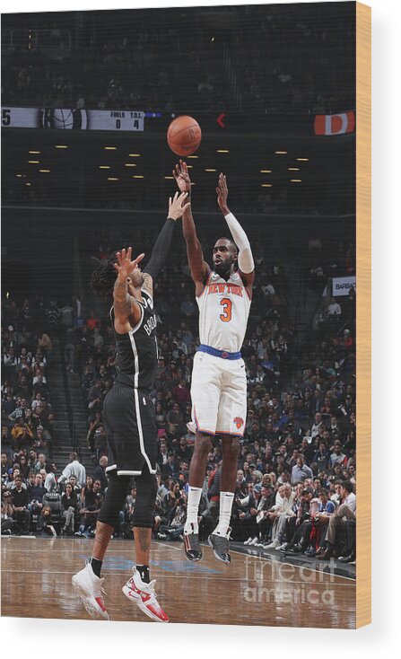 Tim Hardaway Jr Wood Print featuring the photograph New York Knicks V Brooklyn Nets by Nathaniel S. Butler
