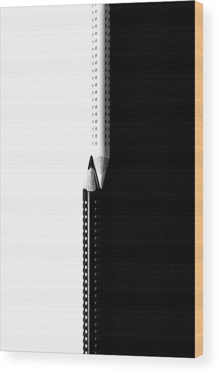 Pencil Wood Print featuring the photograph Two drawing pencils on a black and white surface. by Michalakis Ppalis