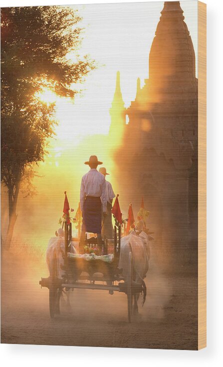 Bullock Cart On A Dusty Track Among The Temples Of Bagan With Light From The Setting Sun Shining Through The Dust Wood Print featuring the photograph 321-5081 by Robert Harding Picture Library