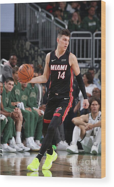 Tyler Herro Wood Print featuring the photograph Miami Heat V Milwaukee Bucks by Gary Dineen