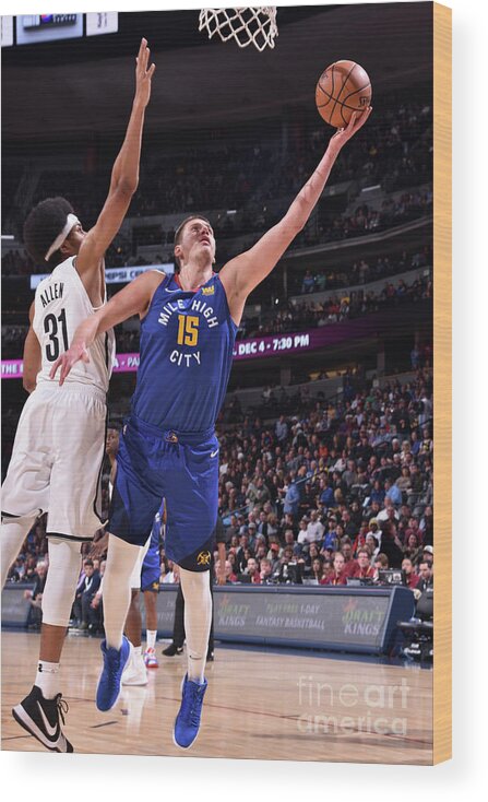 Nba Pro Basketball Wood Print featuring the photograph Brooklyn Nets V Denver Nuggets by Garrett Ellwood