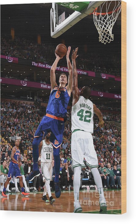 Kristaps Porzingis Wood Print featuring the photograph New York Knicks V Boston Celtics by Brian Babineau