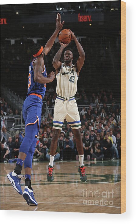 Nba Pro Basketball Wood Print featuring the photograph New York Knicks V Milwaukee Bucks by Gary Dineen