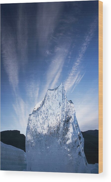 Scenics Wood Print featuring the photograph A Shard Of Aufeis Reaches Toward The by Mint Images - Art Wolfe