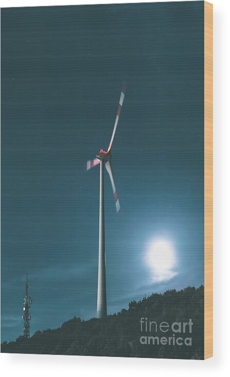 Wind Wood Print featuring the photograph A Wind Turbine On A Full Moon Night by Michael Bohnen